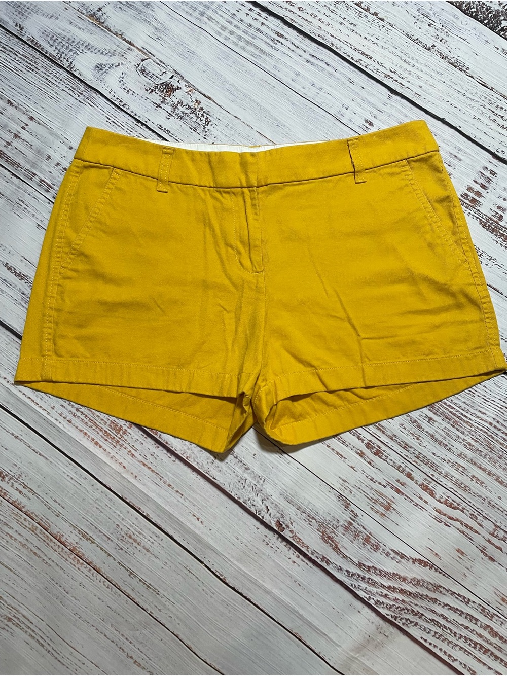 J.Crew Mustard Yellow chino shorts feature a classic tailored fit. Size 10.